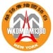 NYAM 1380 - WKDM Logo